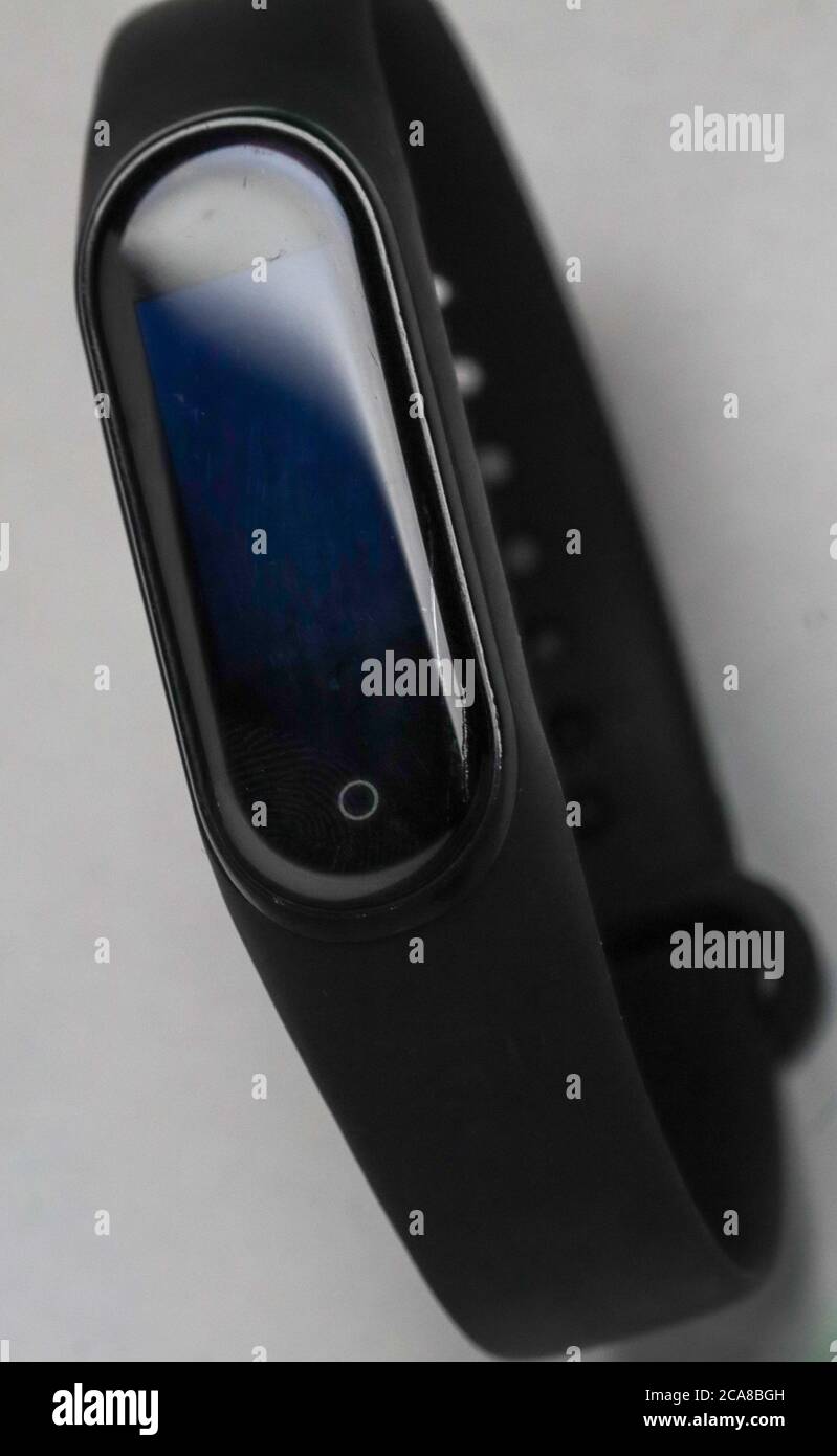 black smartband with a reflection on the screen Stock Photo