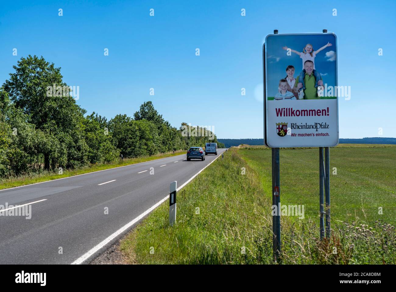 Federal road B265, state border south of the town Kehr, between North Rhine-Westphalia and Rhineland-Palatinate, NRW Crest on the road, Germany, Stock Photo