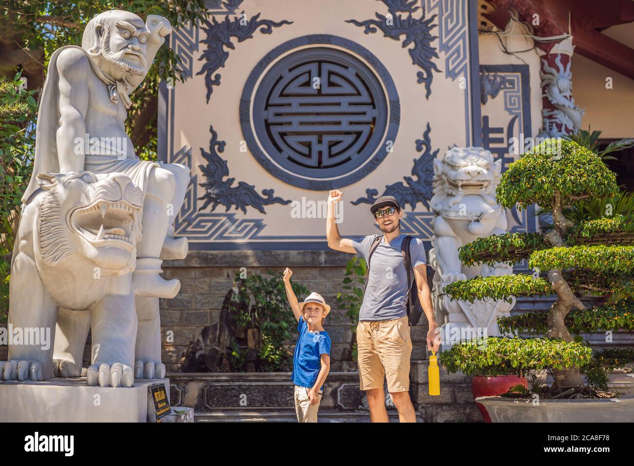 Dad and son tourists in Chua Linh Ung Bai But Temple, Lady Buddha Temple in Da Nang, Vietnam. Traveling with children concept Stock Photo