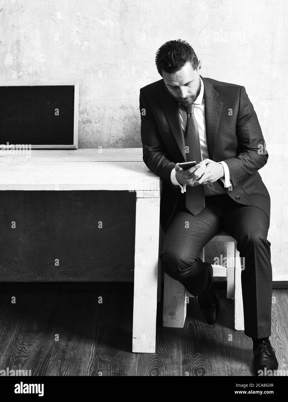 Employee interview texting Black and White Stock Photos & Images - Alamy