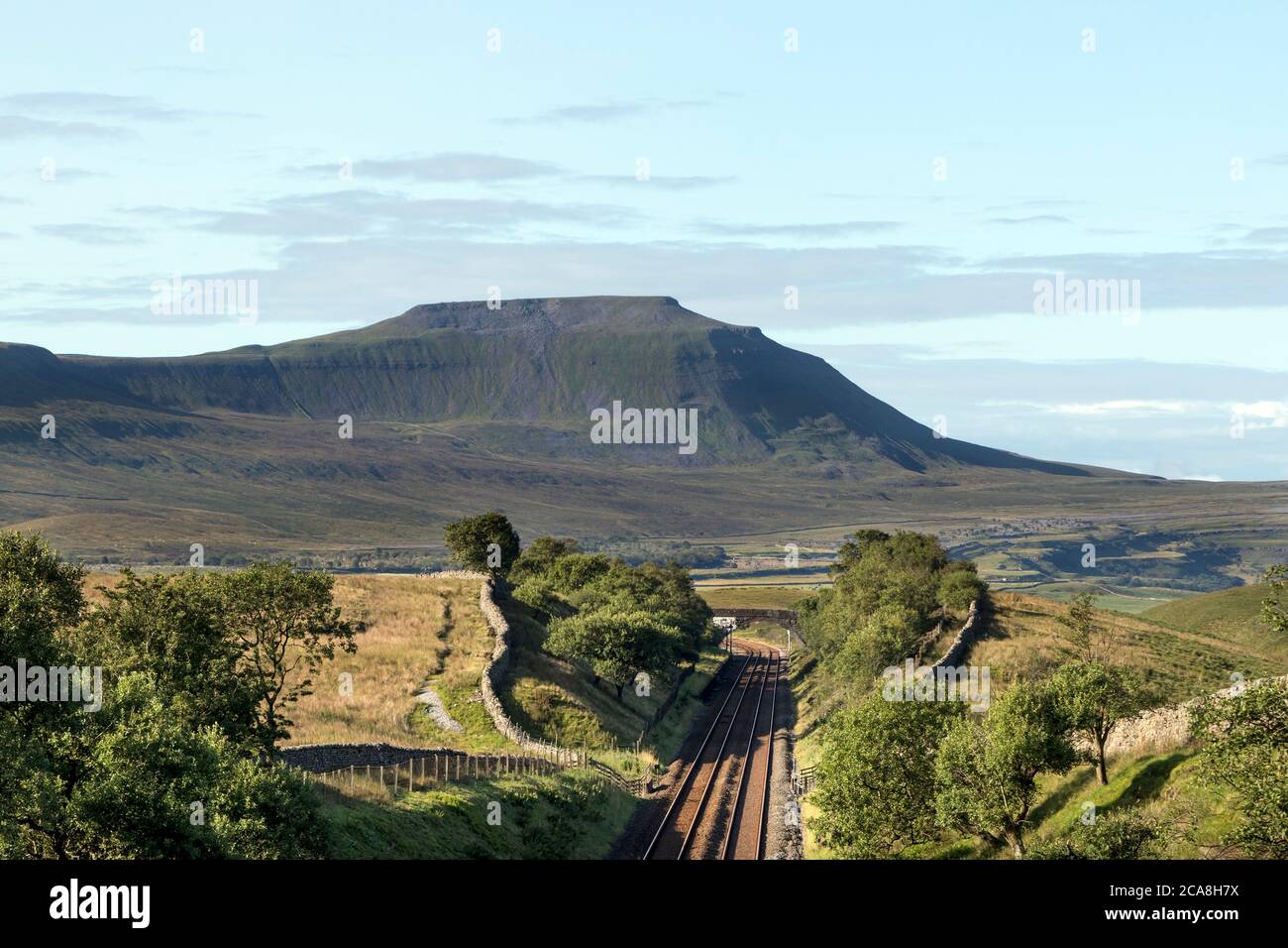 Ingleborough and the Settle to Carlisle Railway Line Viewed from Smithy Hill in Front of the Entrance to the Blea Moor Tunnel, Yorkshire Dales, UK Stock Photo
