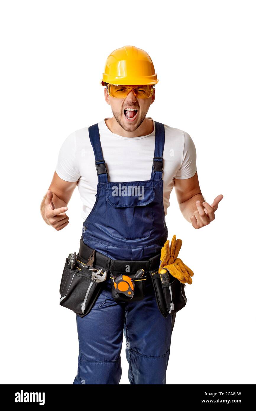 angry caucasian repairman worker in yellow hard hat and uniform