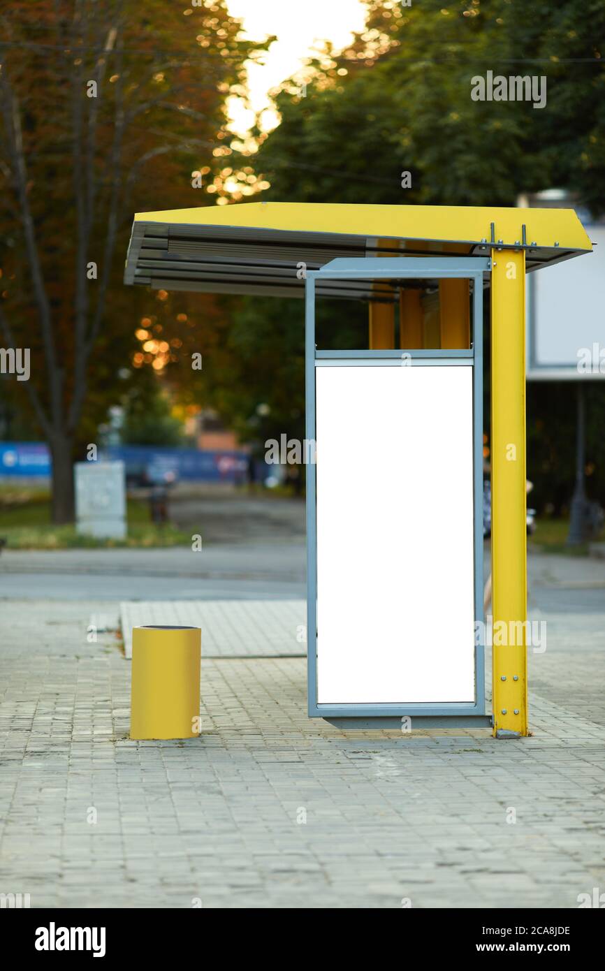 Download Empty Billboard At Tram Stop White Vertical Mockup On The Bus Stop Outdoor Advertising Stock Photo Alamy