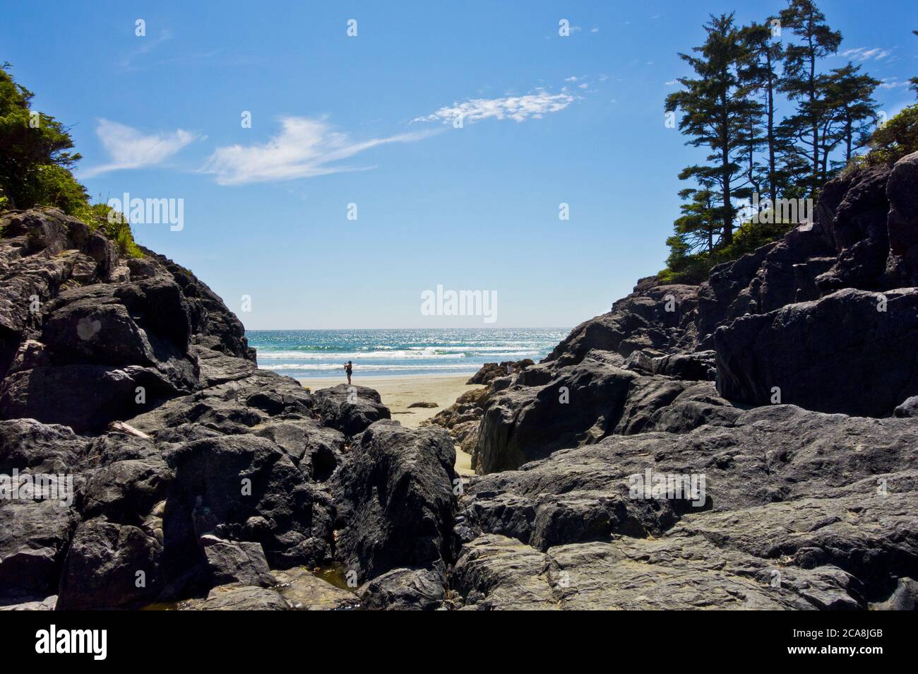 Tofino, BC, Canada: A rocky shoreline at Cox Bay Beach in the summer. Vancouver Island, British Columbia, Canada. West Coast. Stock Photo