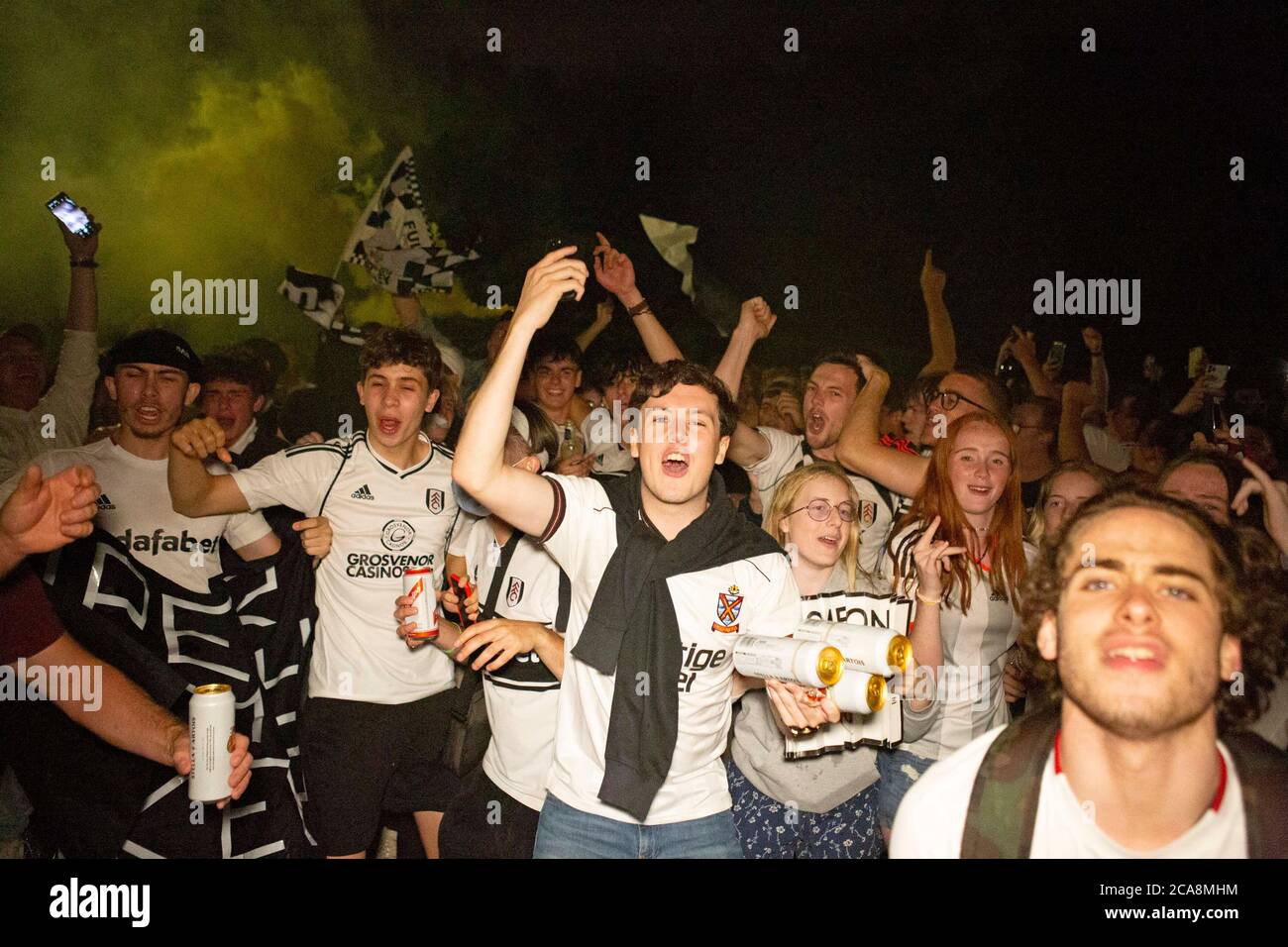 Fulham F.C. fans celebrate their team beating local rivals Brentford F ...