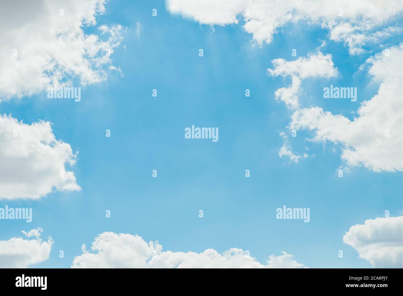 Scenic sky background. Blue sky with fluffy white clouds. Copy space ...
