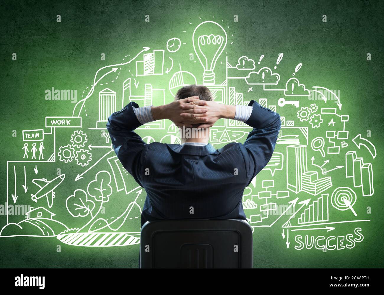 Thinking over his strategy Stock Photo - Alamy