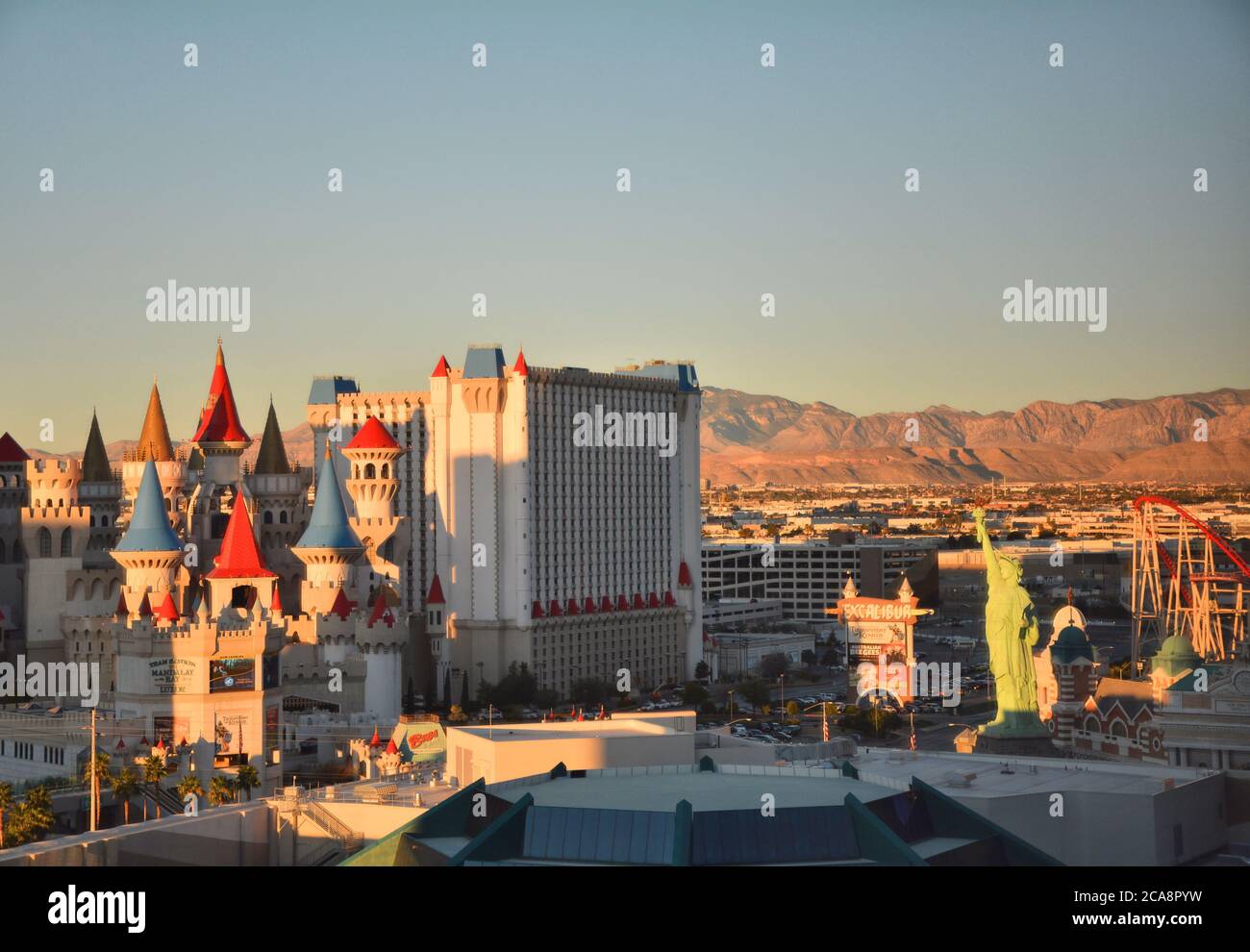 LAS VEGAS, USA - MARCH 18, 2018 : Excalibur Hotel & Casino and New York New York hotel on Las Vegas boulevard in sunset light. Stock Photo