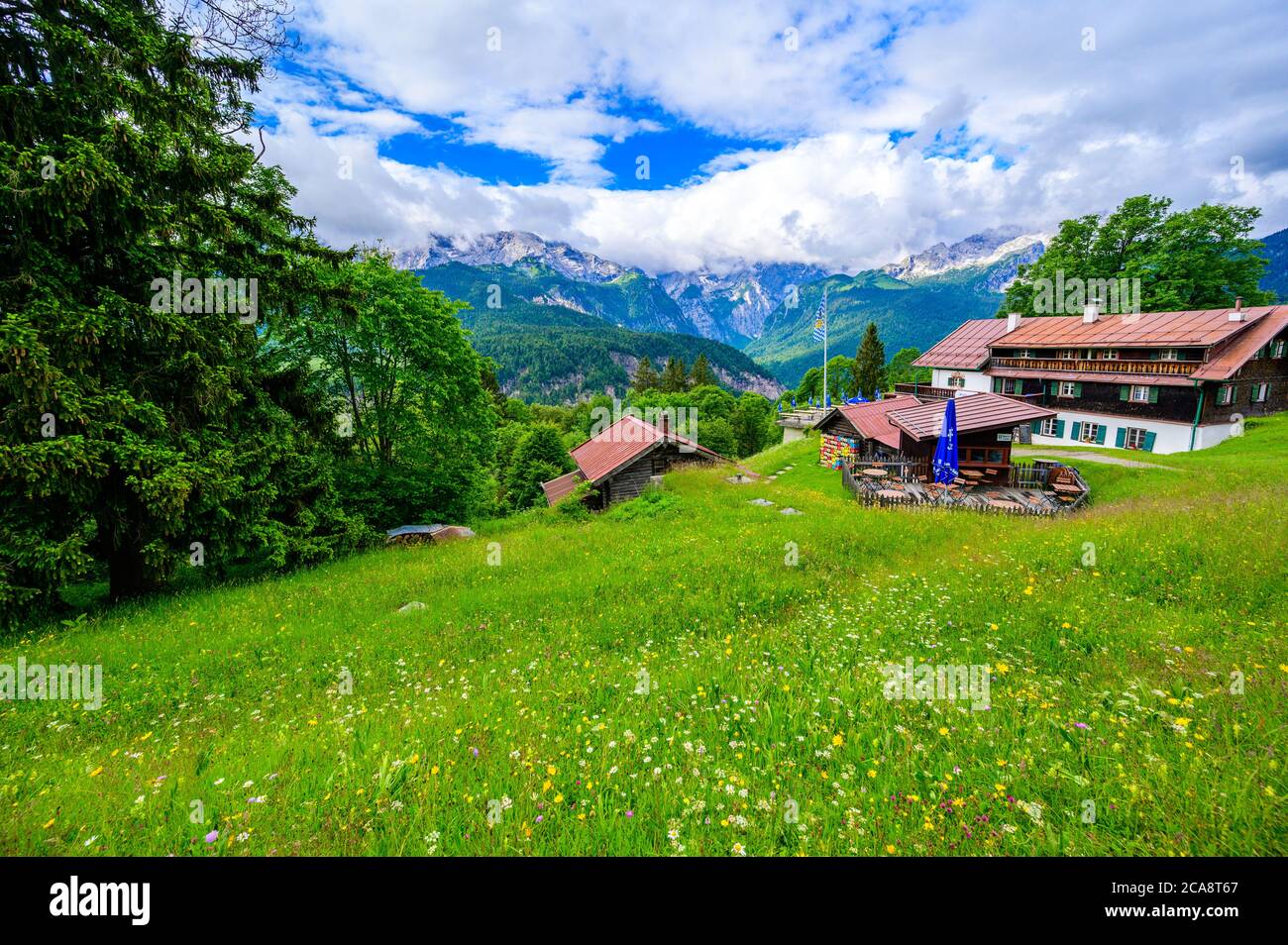 View from the top of Mountain Eckbauer to alps in the region of Garmisch-Partenkirchen, close to Zugspitze - Beautiful landscape scenery in Bavaria, G Stock Photo