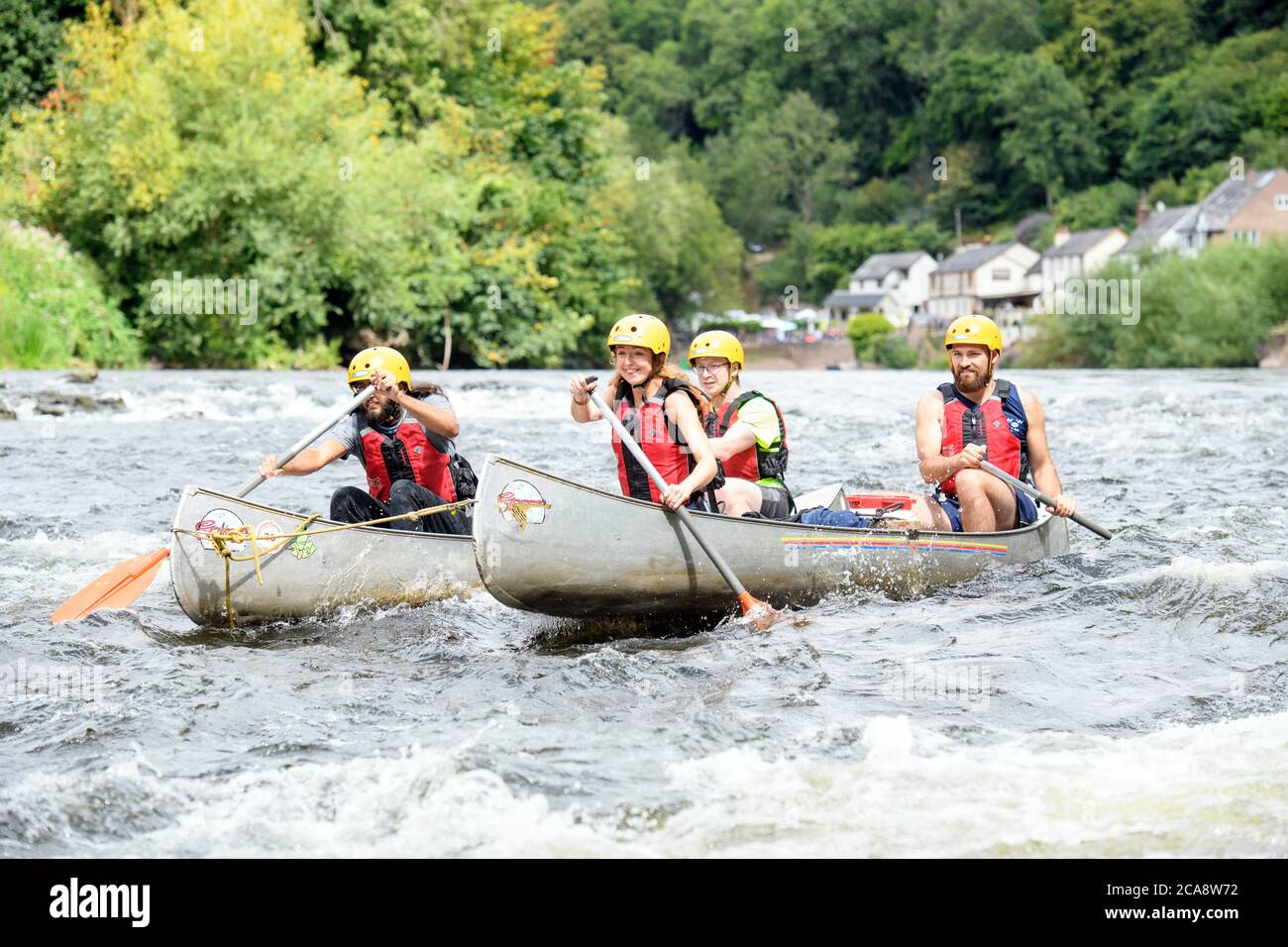 A catamaran canoe on the River Wye at Symonds Yat, Herefordshire UK