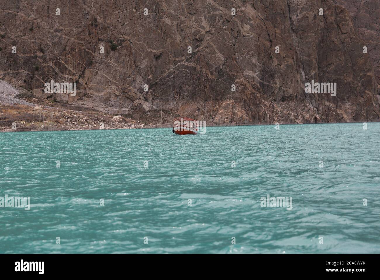 Boat in atabad lake, hunza , Pakistan. Stock Photo