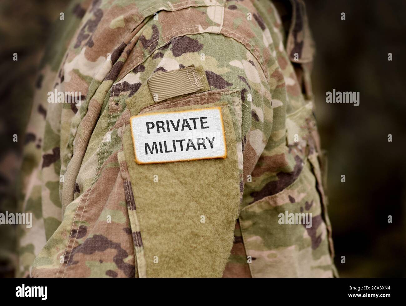 Inscription Private Military on soldier arm. Private Army Stock Photo