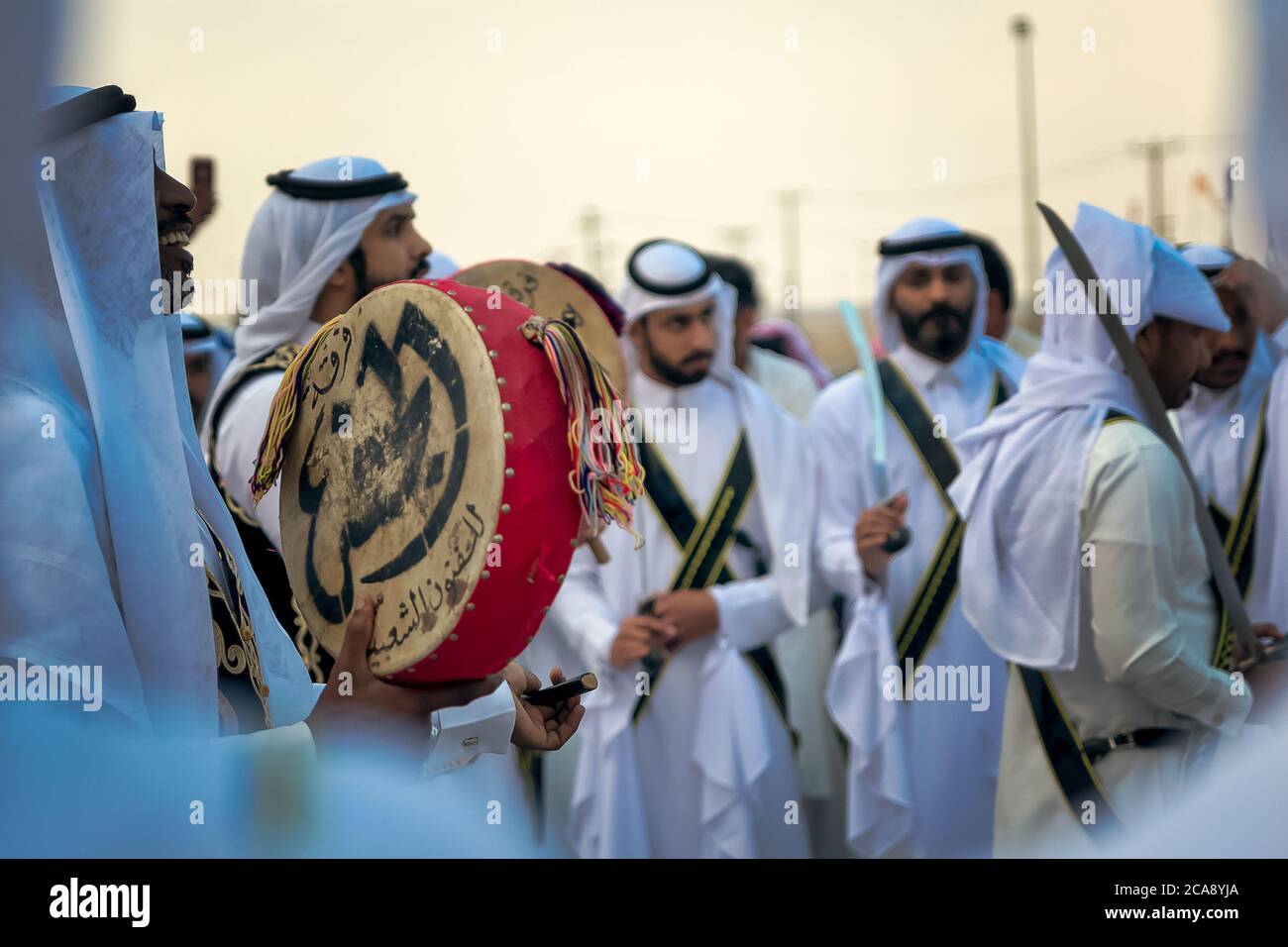 Saudi nationals on dancing in desert safari festival in abqaiq Saudi Arabia 10th January 2020 Stock Photo