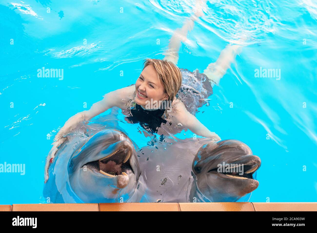 Dolphin suit hi-res stock photography and images - Alamy