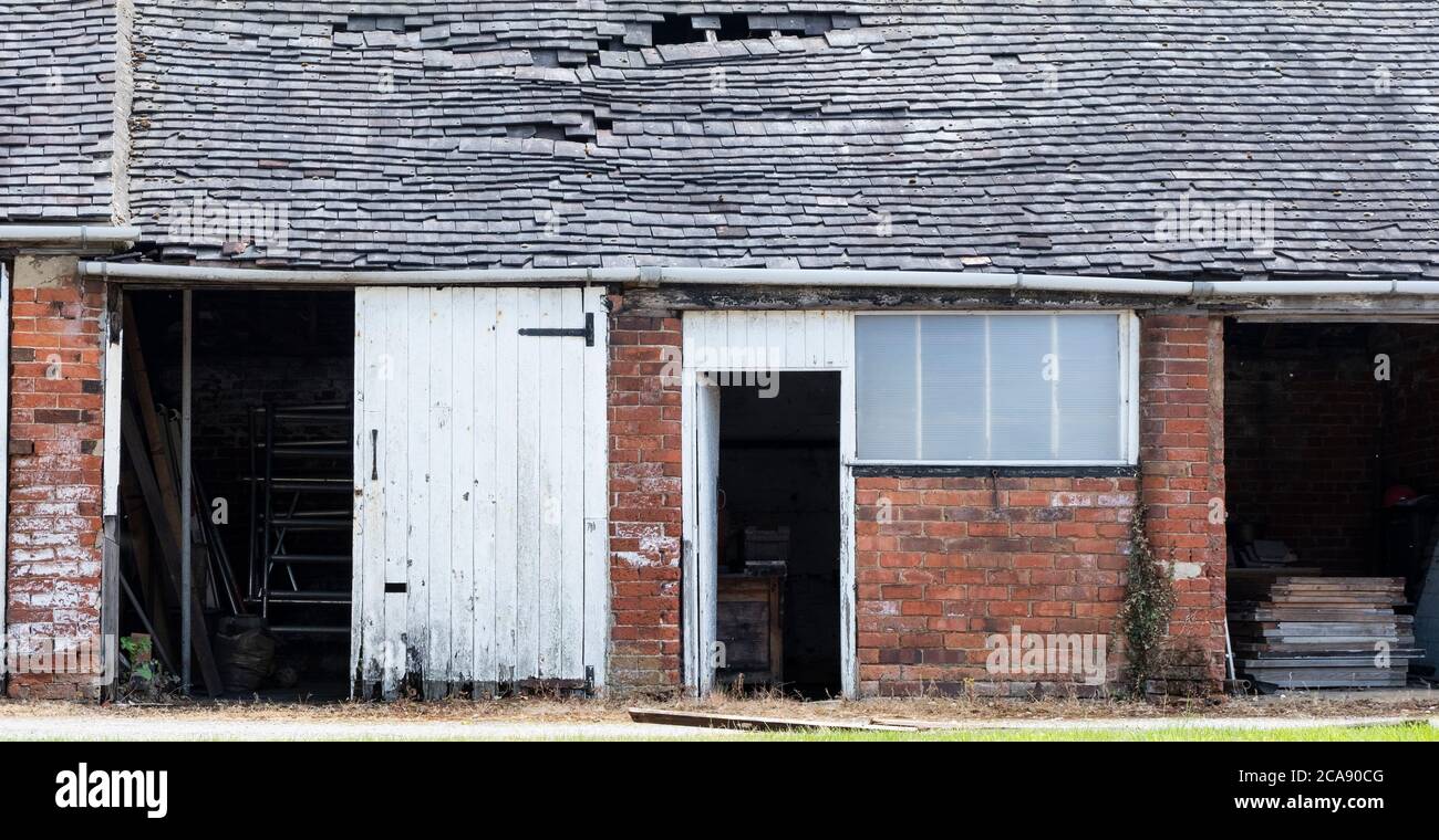 Run down outhouse and store Stock Photo - Alamy