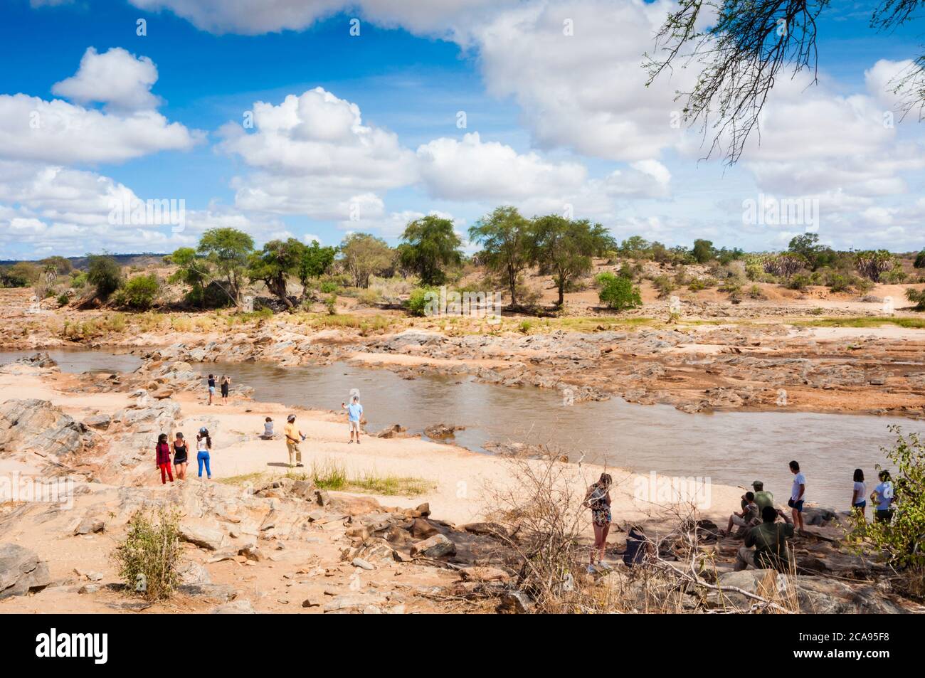 Tourists at Galana River, Tsavo East National Park, Kenya, East Africa, Africa Stock Photo