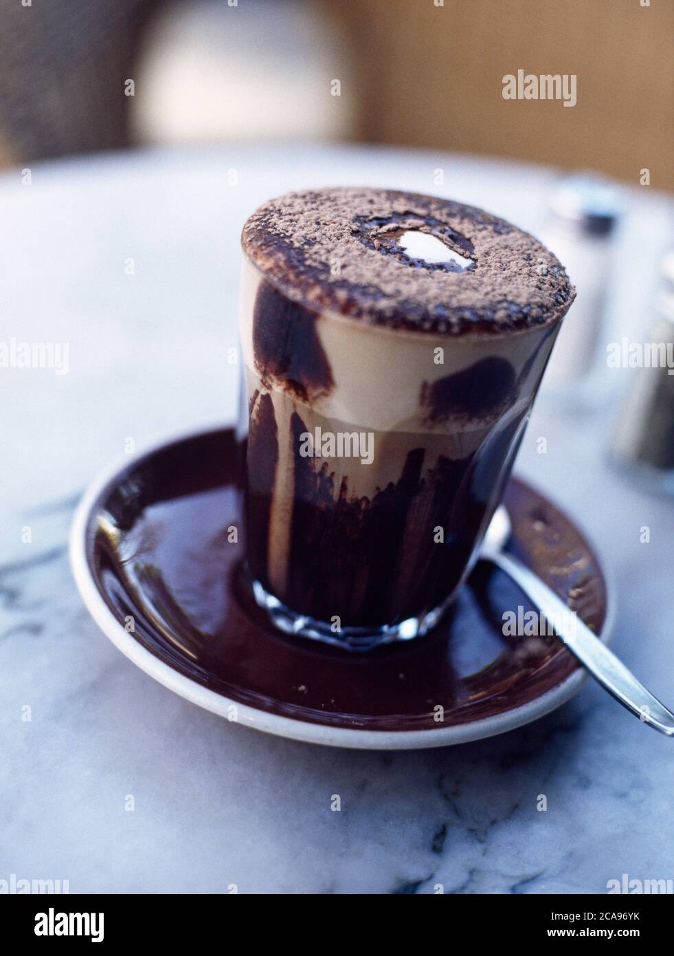 A mocha coffee (latte style) on a cafe table Stock Photo - Alamy