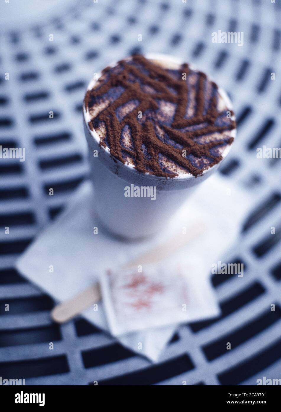 Take away cappuccino with decorative chocolate sprinkles Stock Photo