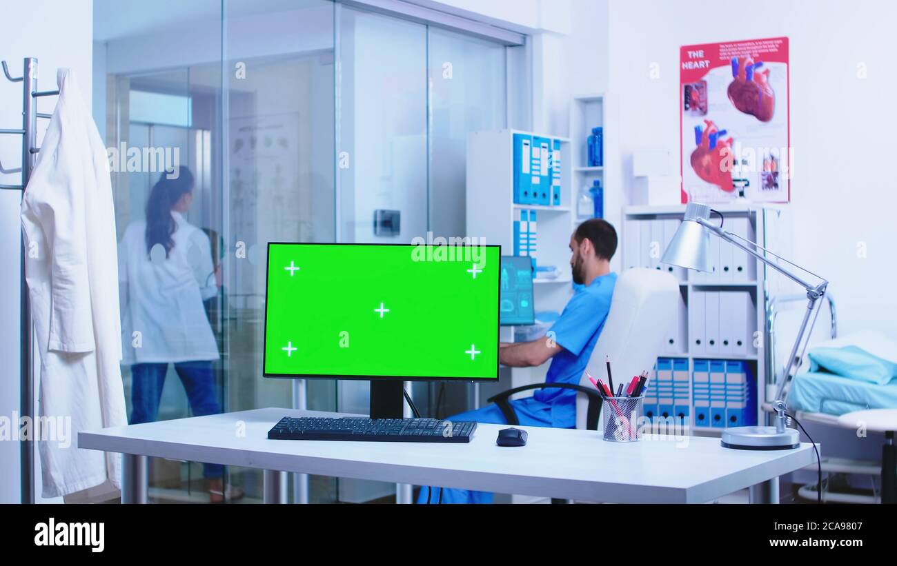 Chroma key on computer in private health clinic. Doctor coat. Health ...