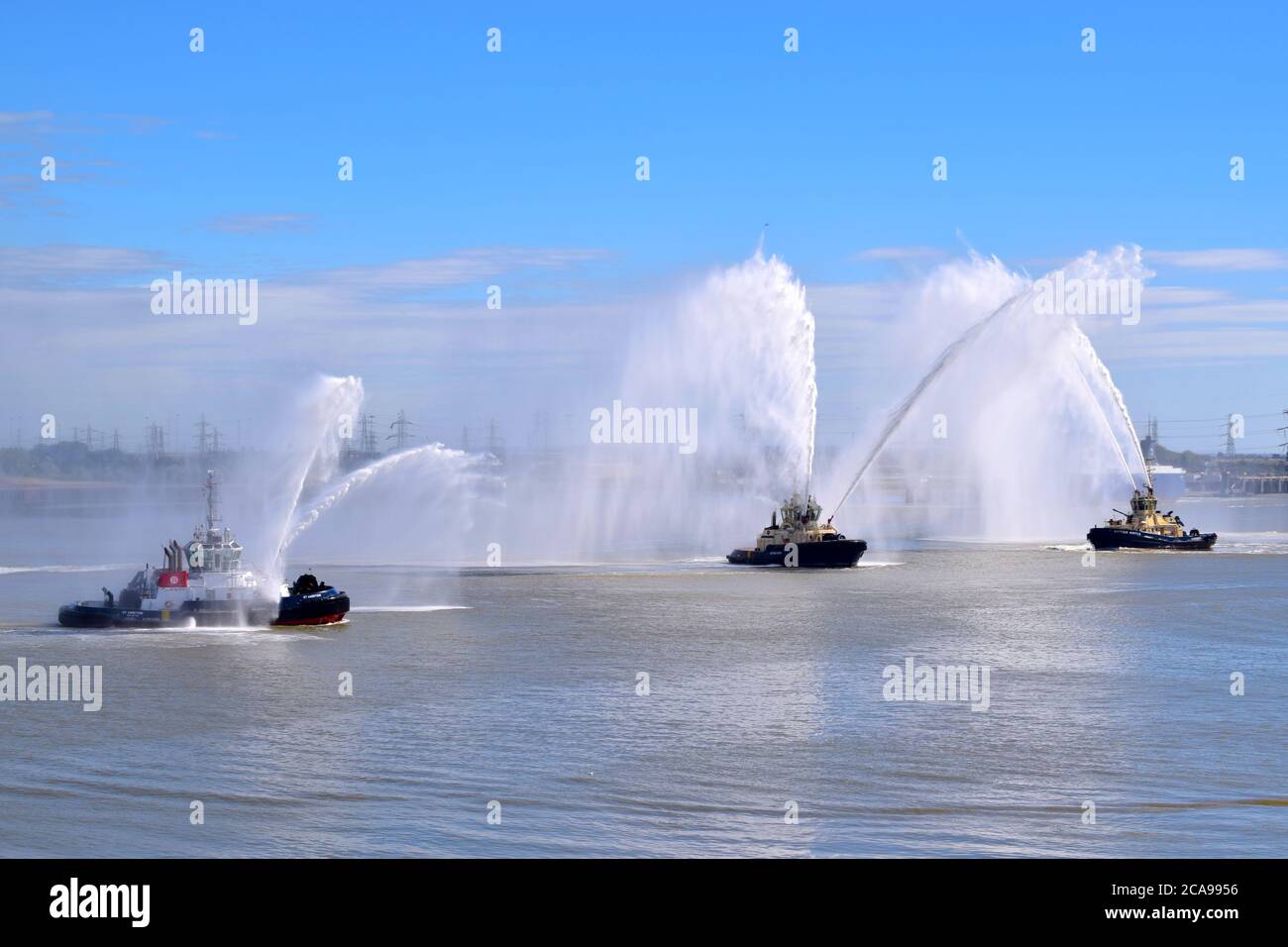 Wednesday 5th August 2020 Gravesend River Thames UK.  The display all started when RT Ambition decided to put on a “water butterfly”.  Svitzer Bootle Stock Photo