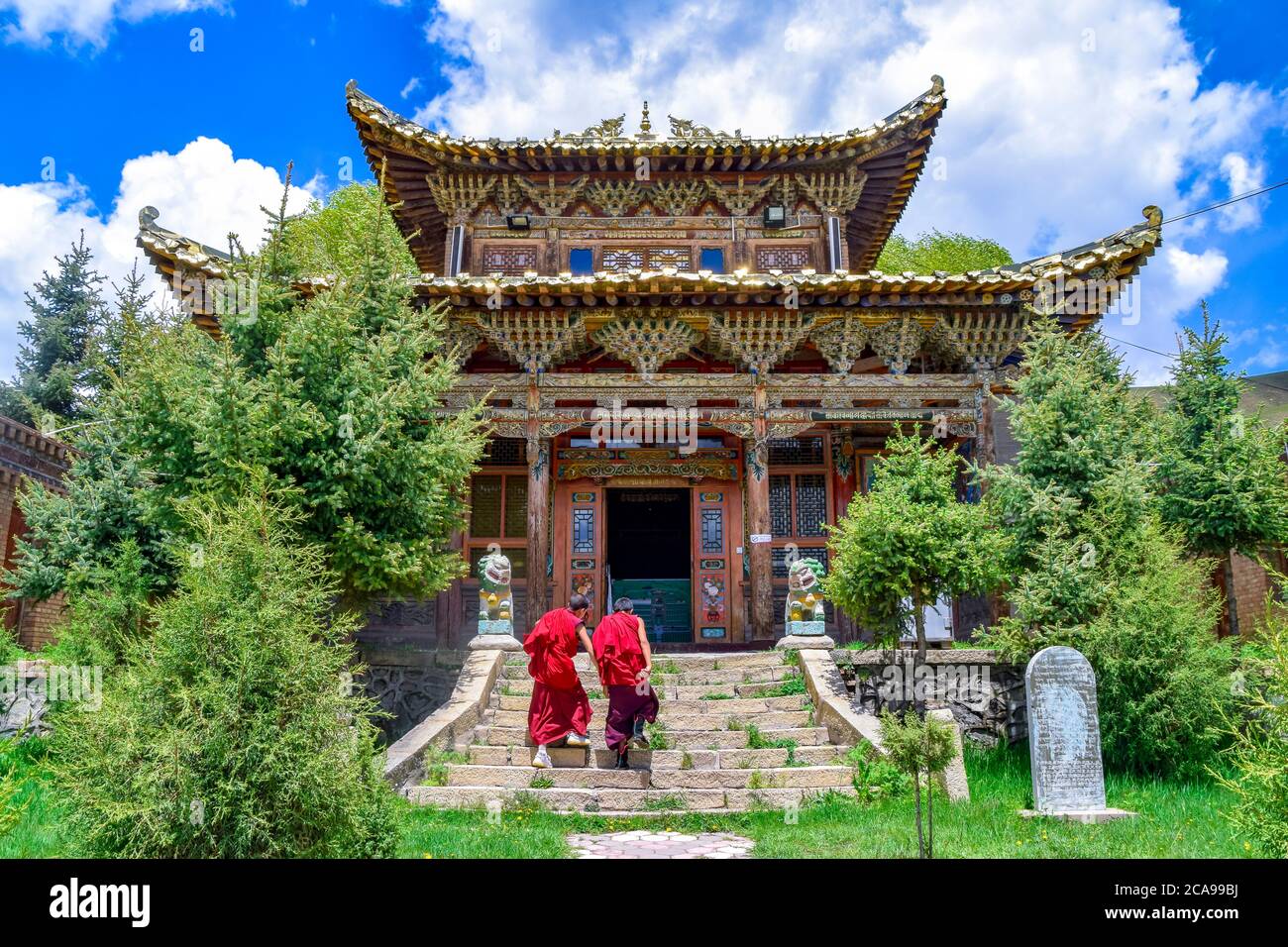 lama going towards the Tibetan Buddhist monastery Arou Temple.A famous historic site in Qilian,Qinghai China. Stock Photo