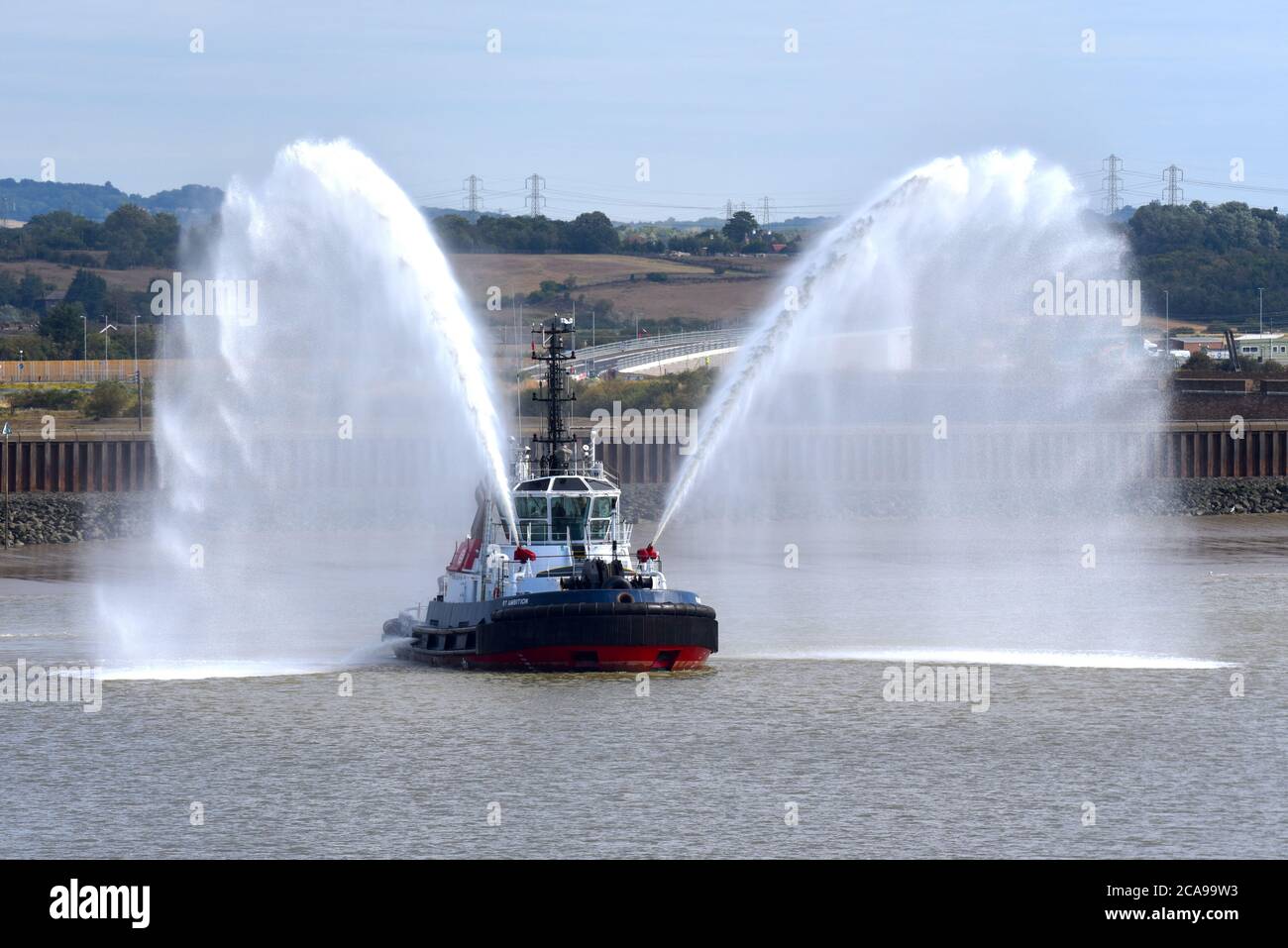 Wednesday 5th August 2020 Gravesend River Thames UK.  The display all started when RT Ambition decided to put on a “water butterfly”.  Svitzer Bootle Stock Photo