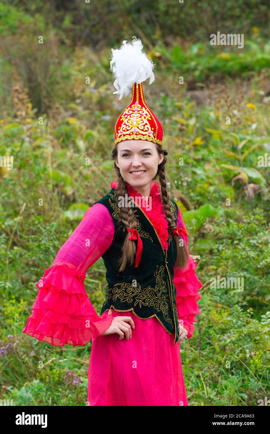 Young Kazakh woman, Kazakh ethnographical village Aul Gunny, Talgar city, Almaty, Kazakhstan, Central Asia, For editorial Use only Stock Photo