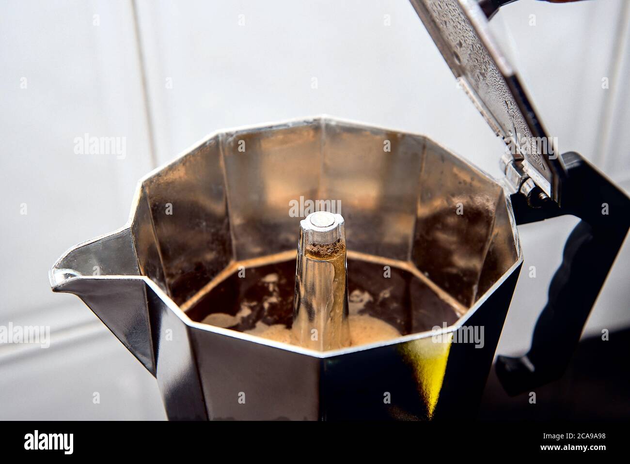 Preparing coffee in Italian coffee maker Stock Photo Alamy