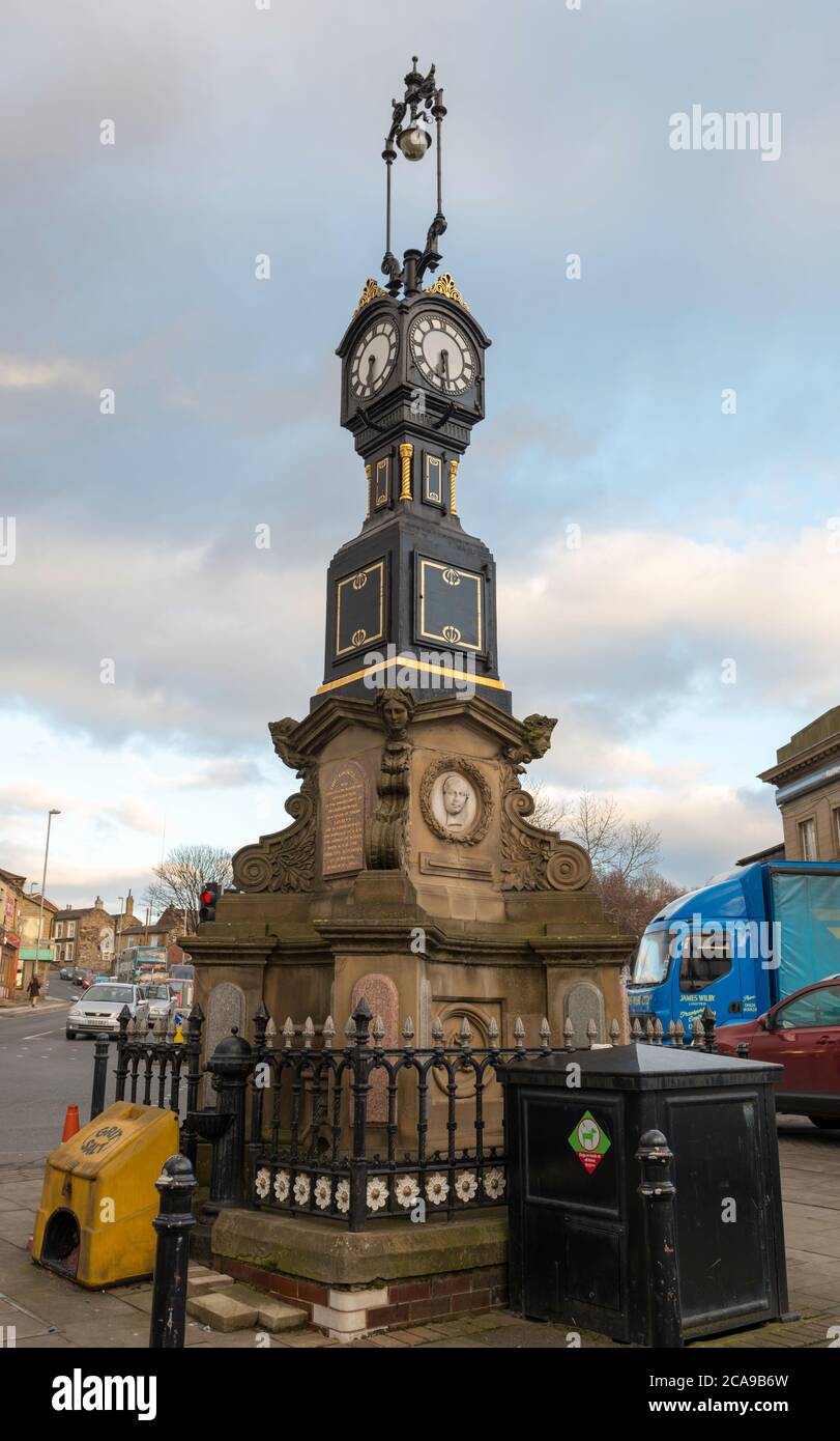 The town clock and drinking fountain in the centre of the West Yorkshire town of Heckmondwike Stock Photo