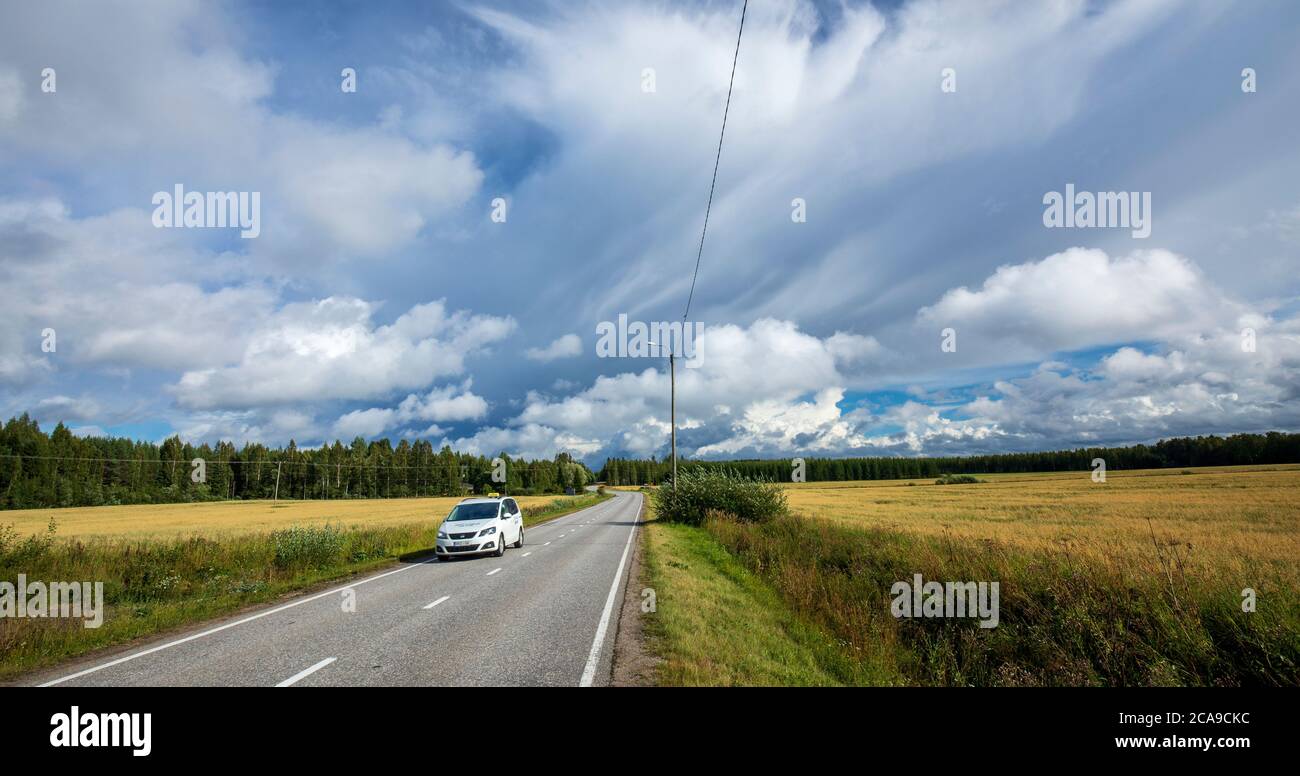 Finnish taxi car driving at countryside , Finland Stock Photo