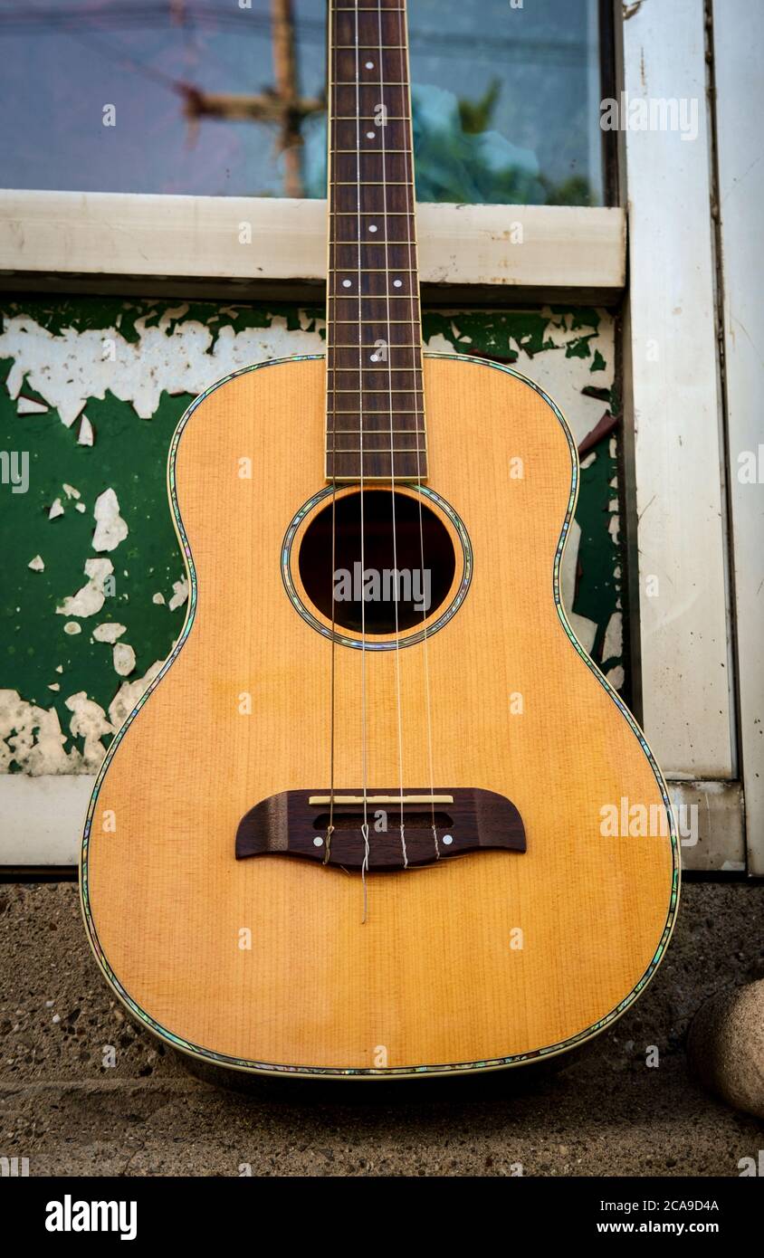 Acoustic baritone ukulele guitar Stock Photo Alamy