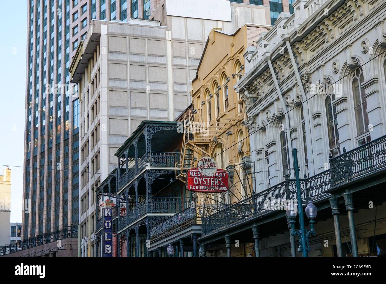 New Orleans - 04/15/2018 : old buildings with balcony and modern architectures in Canal Street Stock Photo
