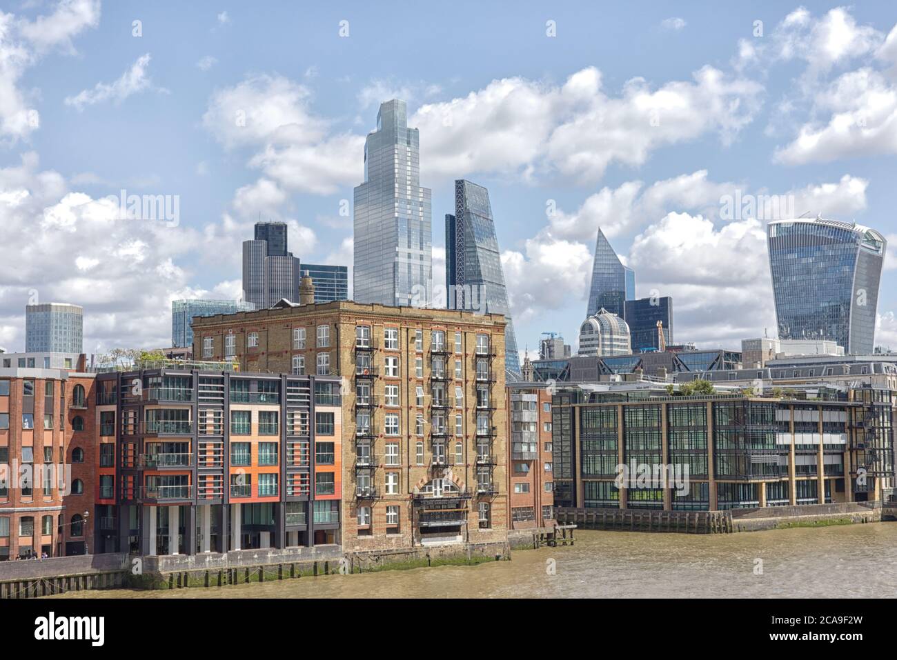 skyscrapers and apartment buildings on the river thames, taken from the