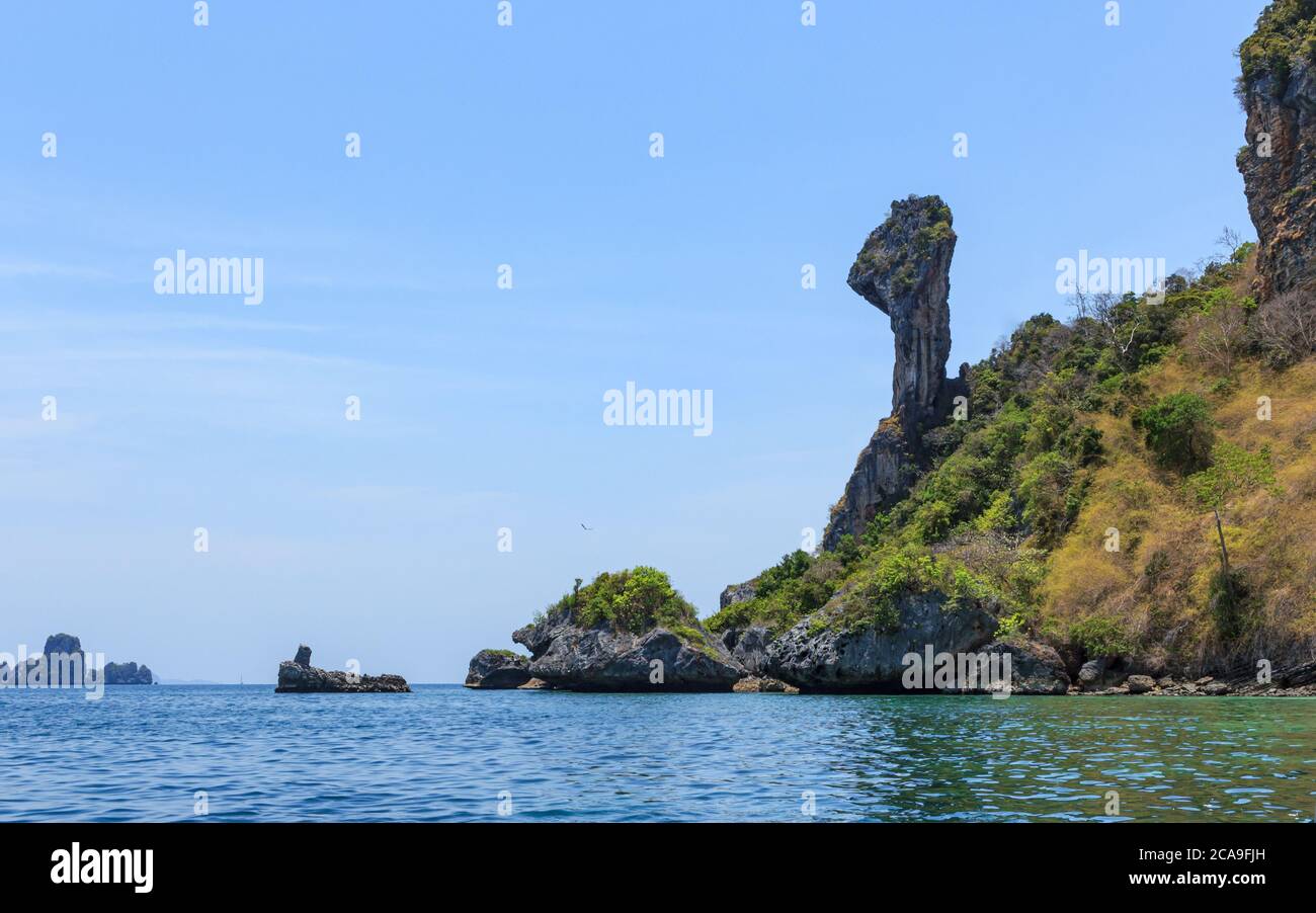 Huge green rock mountains, view from the boat in Thailand Stock Photo