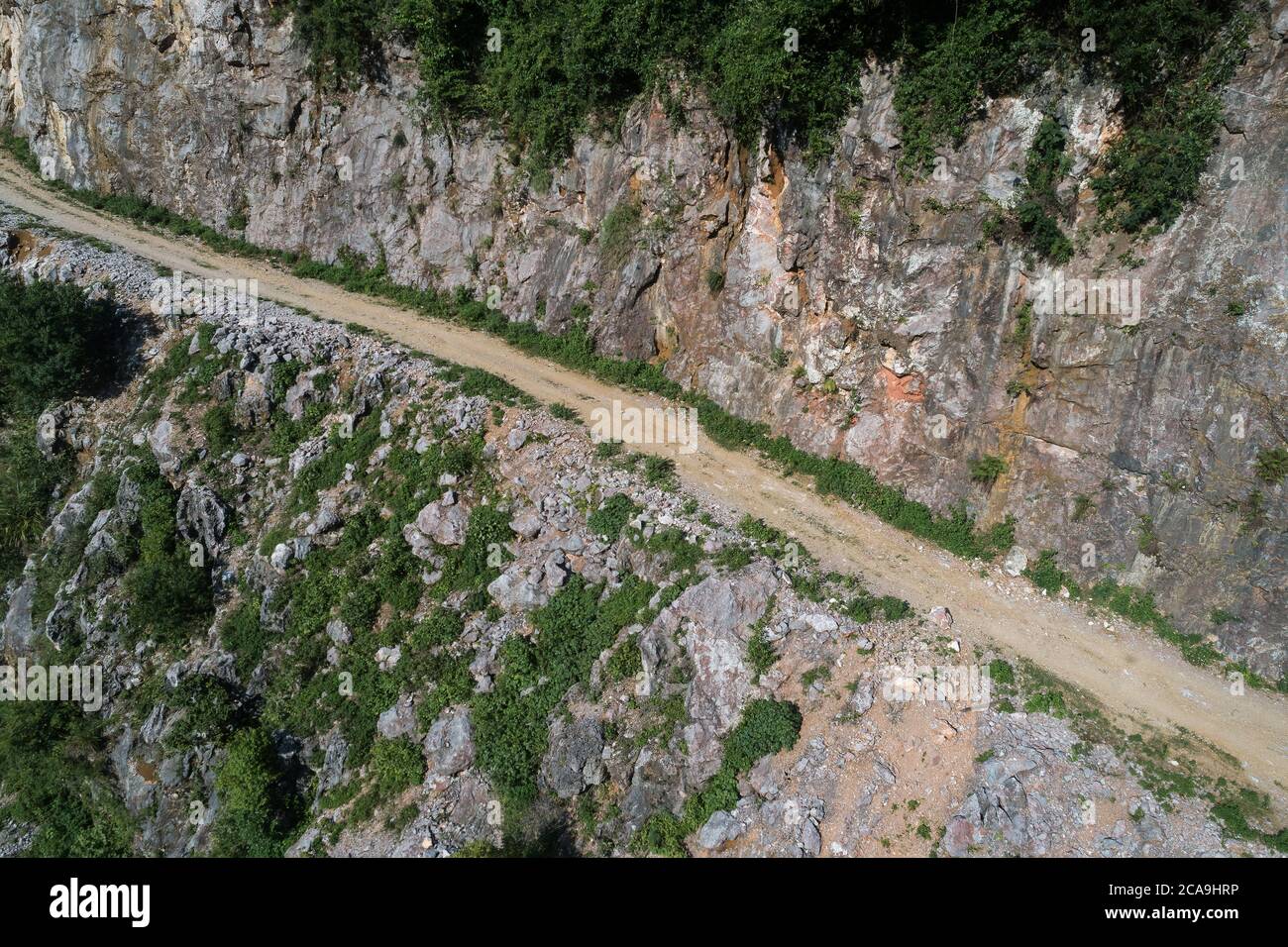 Road rough rocky mountains hi-res stock photography and images - Alamy