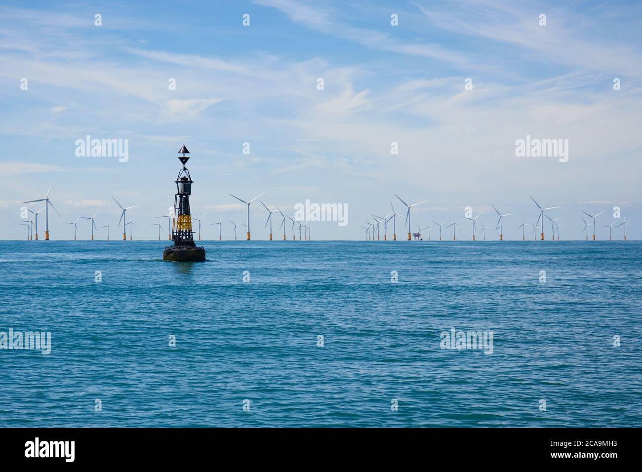 Thanet wind farm offshore windfarm behind the Drillstone Buoy Kent coast Thames estuary UK Stock Photo
