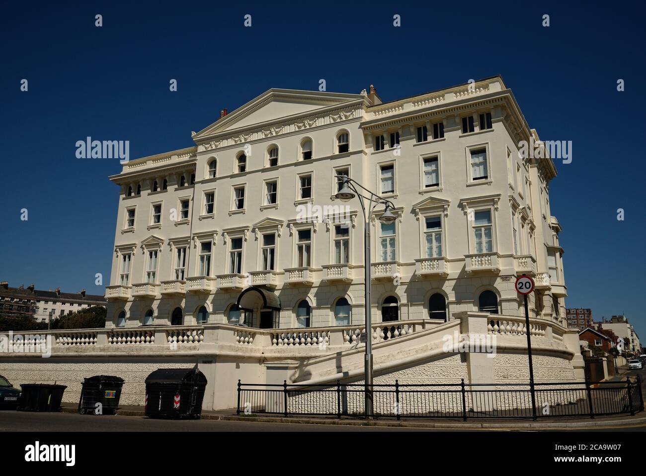 Brighton seafront property. White stucco plaster Palladian architecture. Stock Photo