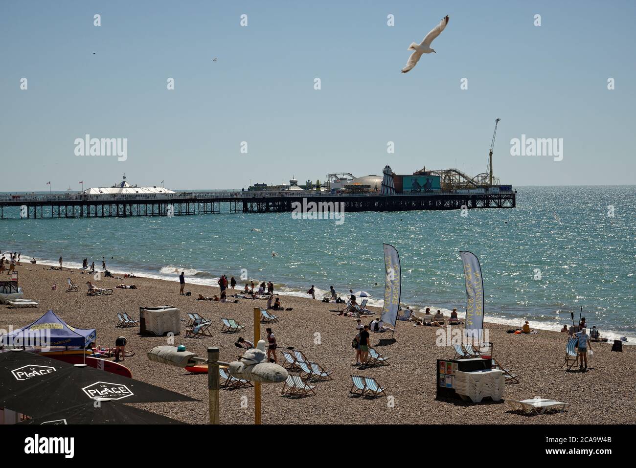 Brighton beach on a summers day, midweek. Stock Photo