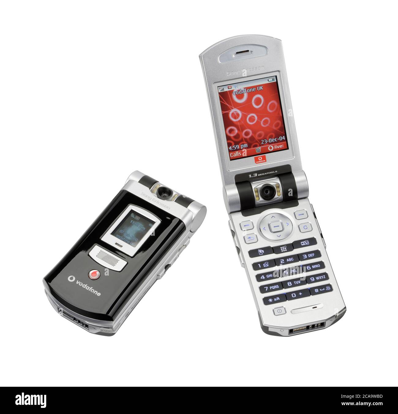 A Sony Ericsson mobile phone from year 2004. Vodafone tied contract telephone that has a flip open mechanism. Stock Photo