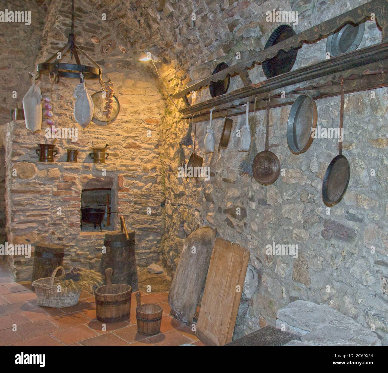 Spišské Podhradie Slovakia July 31, 2020 Medieval kitchen with oven and museal utensils for cooking Spissky hrad, Spiš Castle. Stock Photo