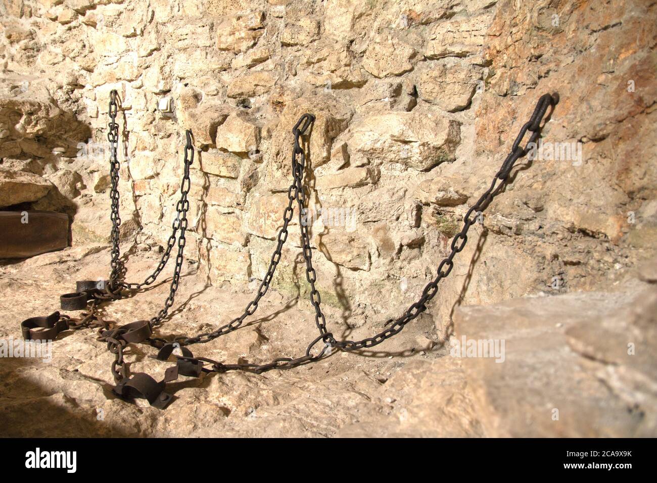 Spišské Podhradie Slovakia July 31, 2020 Iron bondage and chain. Medieval device in the torture chamber of the Spissky hrad, Szepes vár. Stock Photo