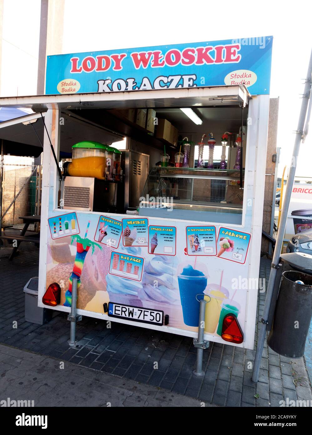 Polish mobile ice cream stand set up in a shopping mall parking lot