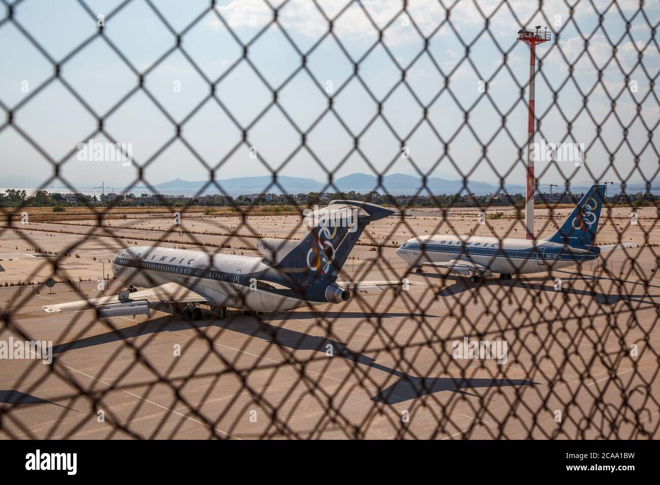 Old Boeings, a 727 and a 737, grounded at the old airport of Elliniko, in southern Athens, Greece, Europe. They carry the colors of Olympic Airways Stock Photo