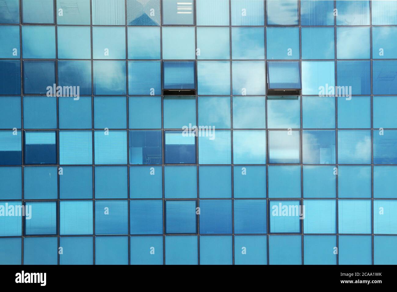 Clouds reflected in the glass facade of a skyscraper close up Stock ...