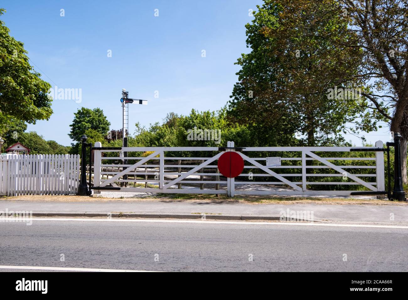 Former level crossing at Hadlow Road station Willaston Cheshire May