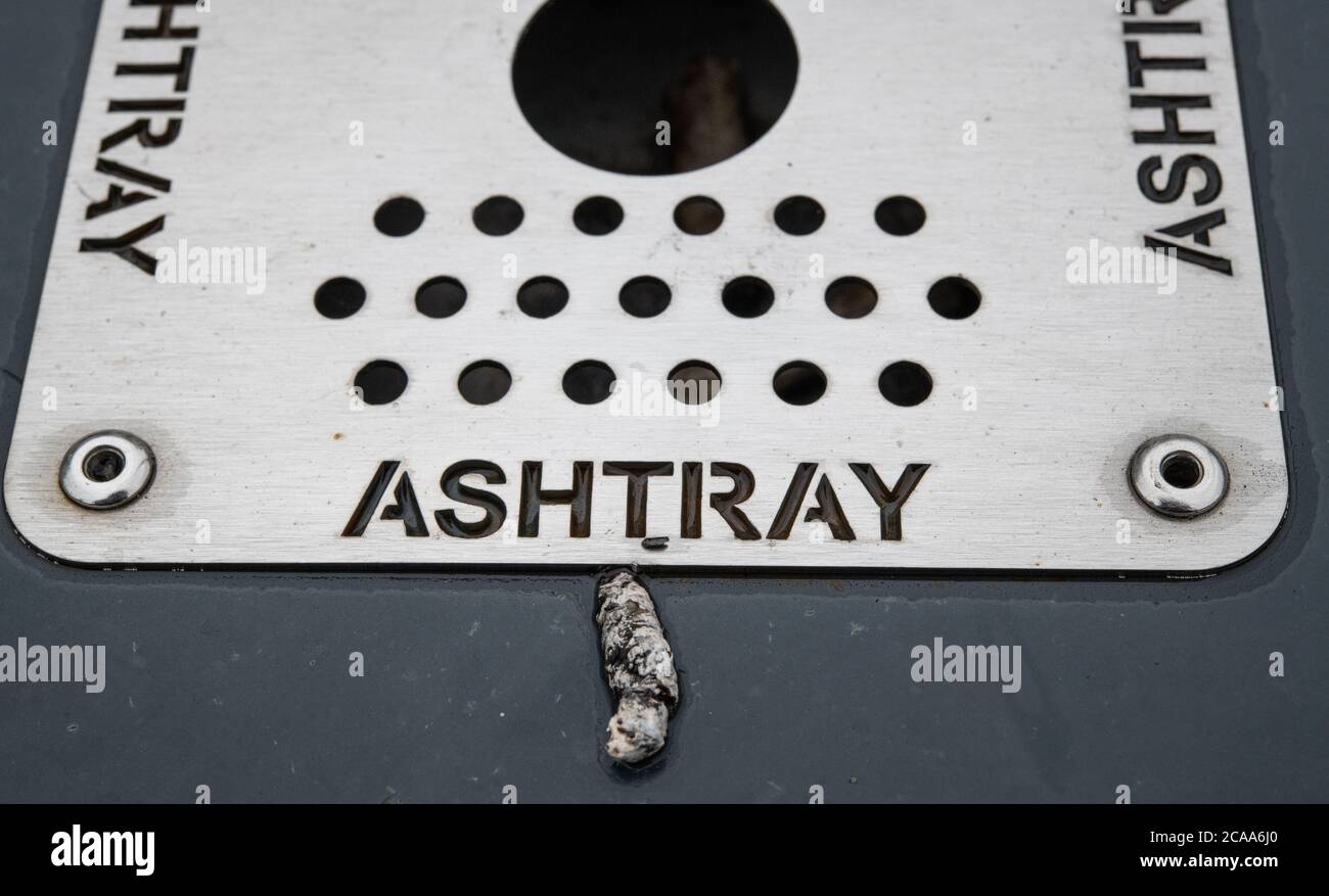 HEMEL HEMPSTEAD - ENGLAND 04 AUG: Metal ash tray on top of refuse bin in Hemel Hempstead, UK on the 4th of August 2020 Stock Photo