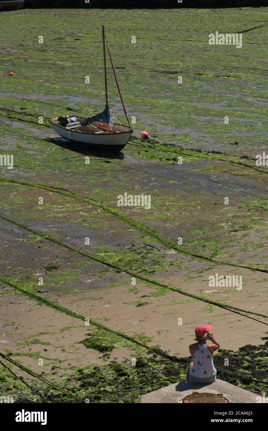 Tide Small Rope Mousehole harbour low tide Small boat dried out Mooring ropes lying ...