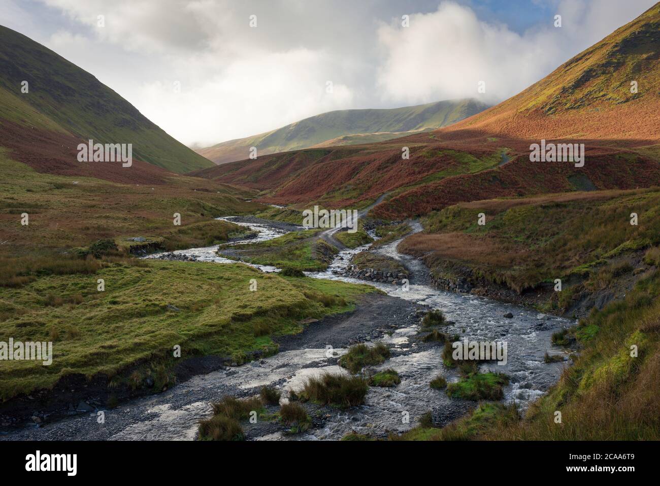 The confluence of the River Glenderamackin and Bullfell Beck with Bannderdale Crags beyond in the Lake District National Park, Cumbria, England. Stock Photo