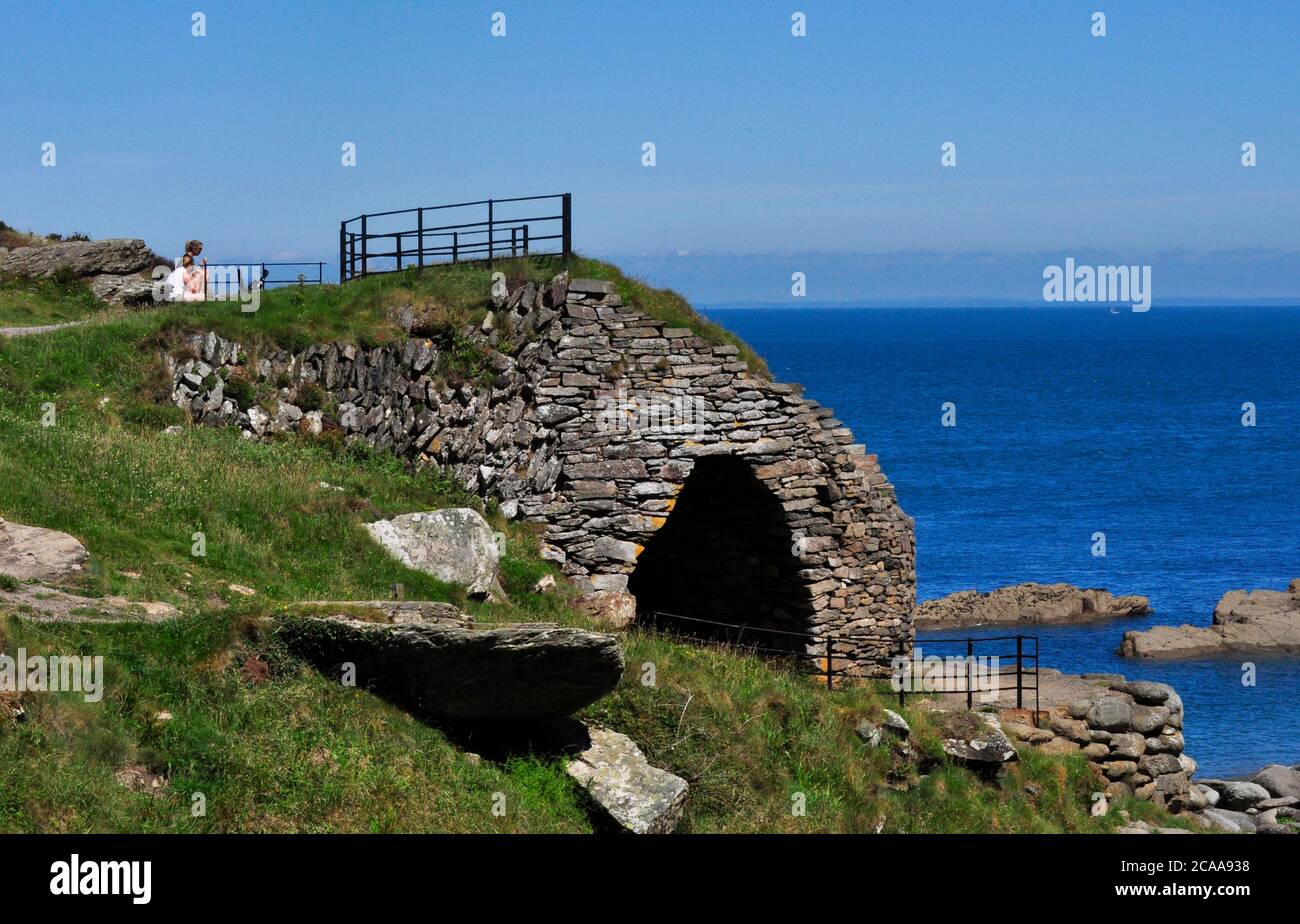 The Lime Kiln at Heddon Mouth on the North Devon Coast with a view of Wales on the horizon. Stock Photo
