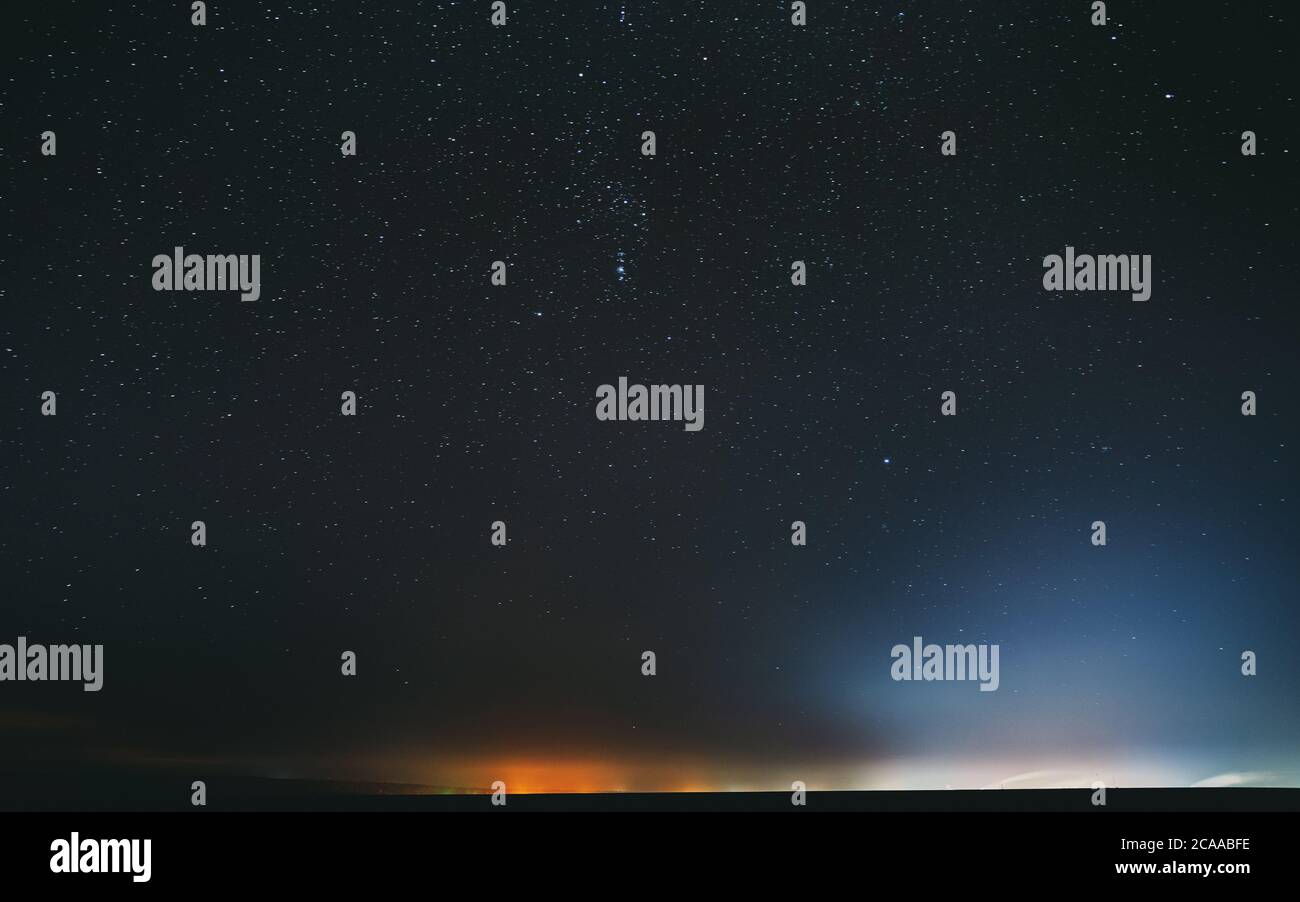 Night Starry Sky With Glowing Stars Above Countryside Landscape. Rural ...